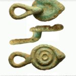 Image of a Roman copper alloy button loop and fastener found in Gloucestershire (GLO-38BB12). Copyright: Bristol City Council, CC-BY Licence.