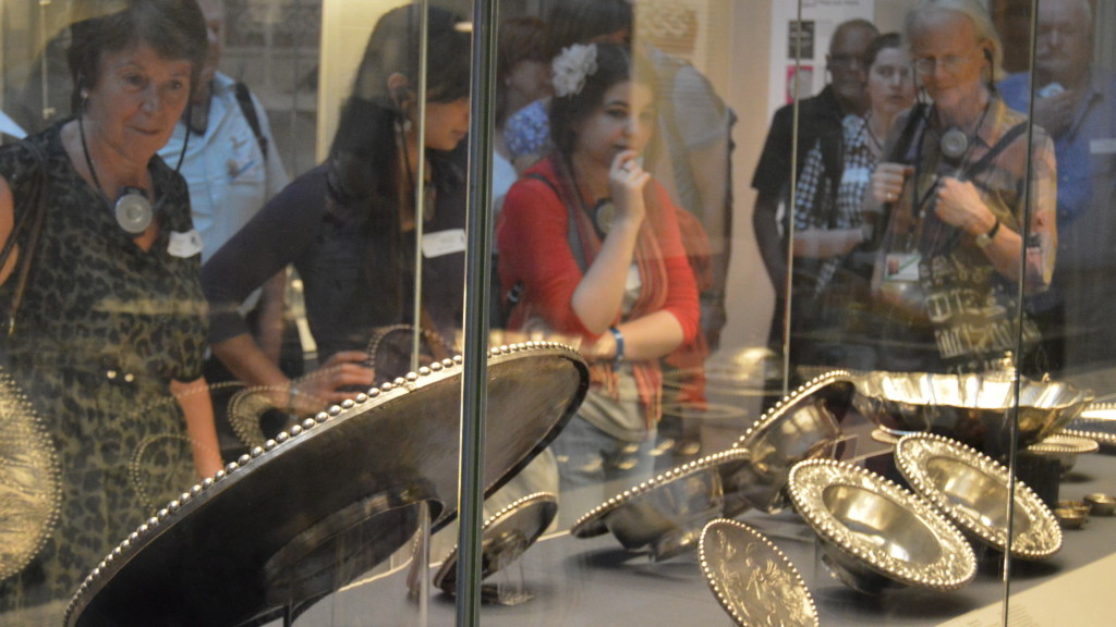 During a tour of the Roman Britain gallery at the British Museum, volunteers admire the Mildenhall Treasure which was found during ploughin in Suffolk.