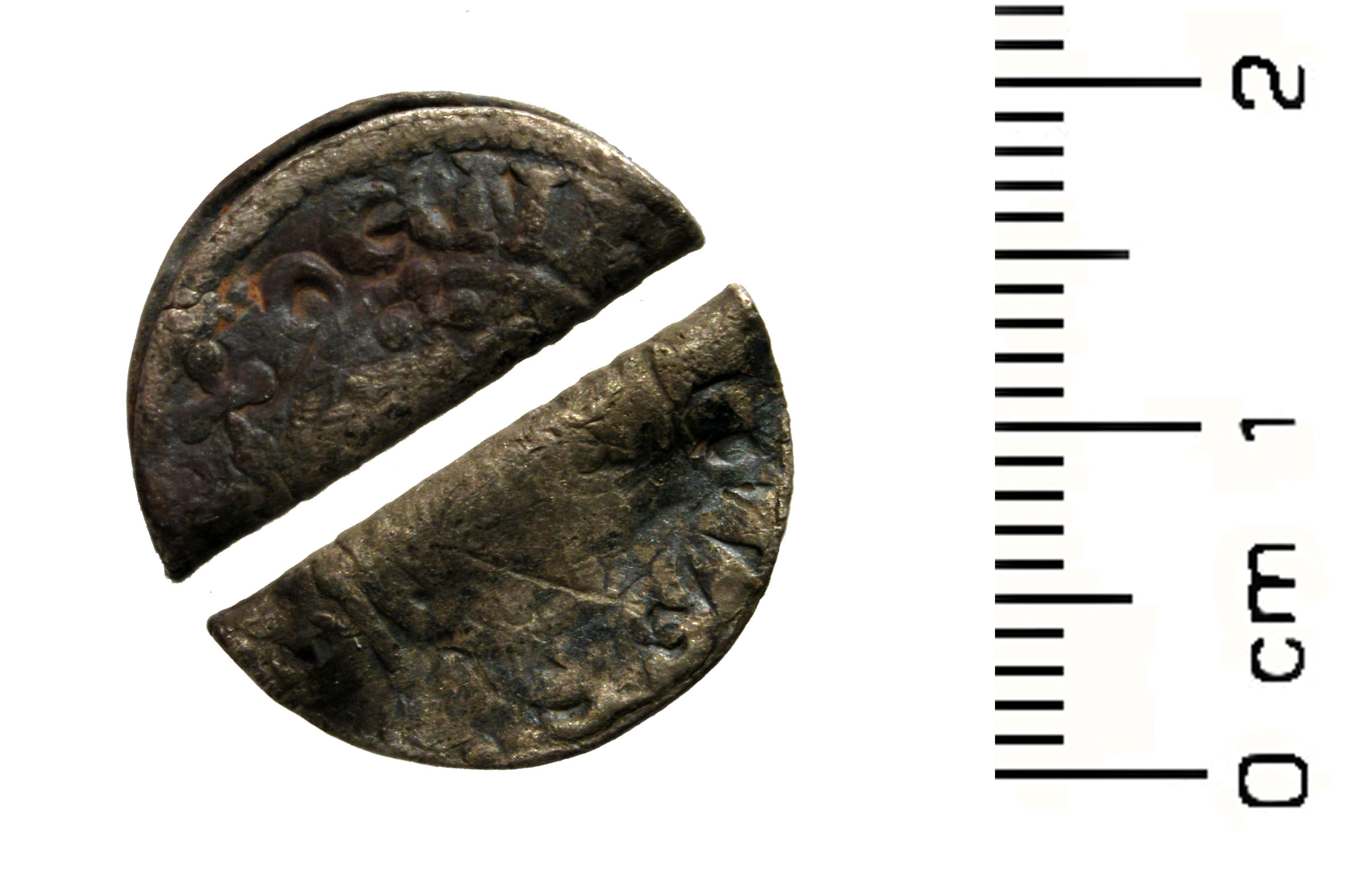 A Silver penny of a later Plantagenant king, probably post AD 1204. The penny has been folded in two with the reverse being unobserved.