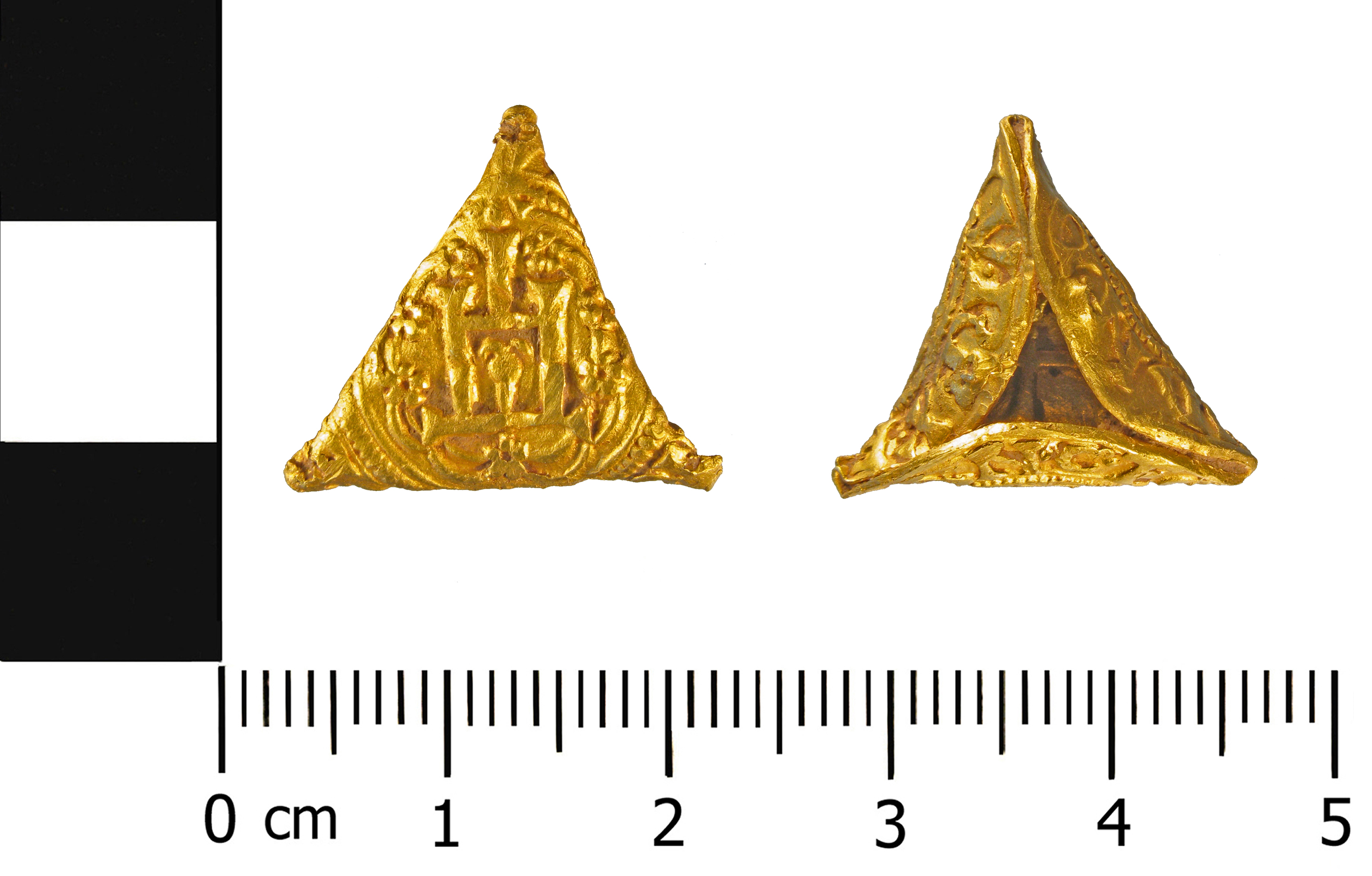 a gold ducat of Genoa, under Louis XII of France (1498-1515), dating 1499-1507.purposefully folded to form a triangle with the obverse of the coin on the outer face