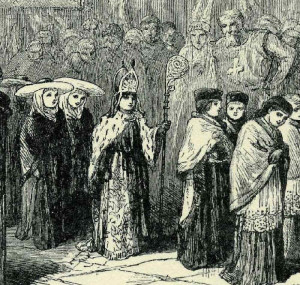 19th century depiction of a Boy Bishop attended by his canons. Unknown Author [Public domain], via Wikimedia Commons. 