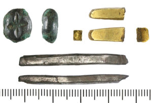 Ingots of copper alloy, gold and silver from the Torksey area (YORYM-420D6D, DENO-938F91 and DENO-705A57). The Vikings used bullion, such as these ingots, as well as coins.