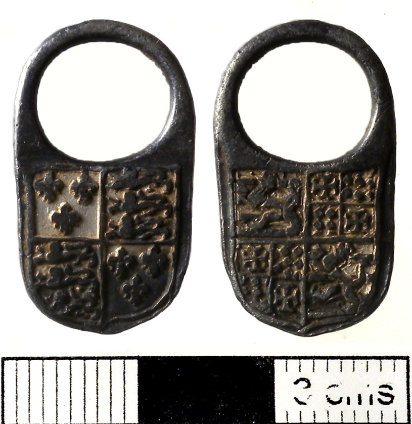 Image of the the front and reverse of a silver hawking ring showing the coat of arms of Charles Brandon, 1st Duke of Suffolk. of 